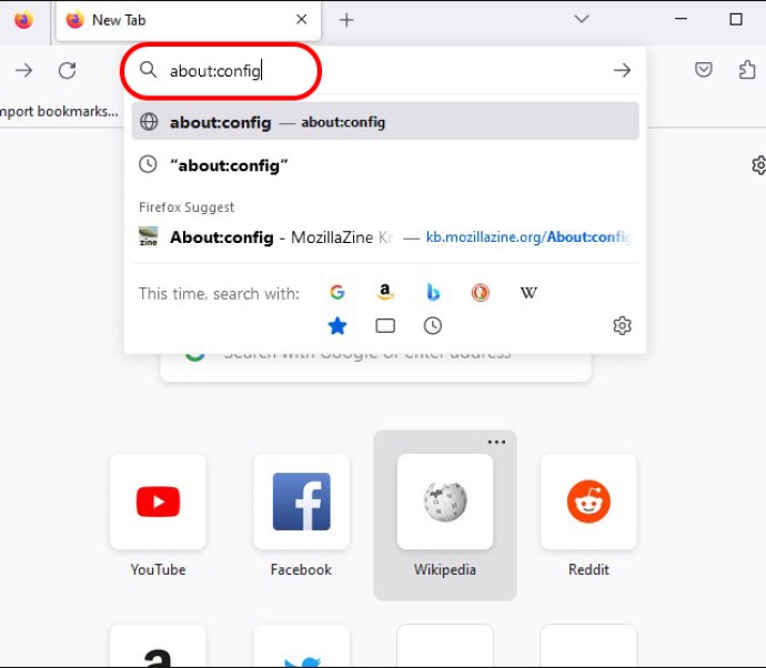 Typing about:config into the search bar in Mozilla Firefox